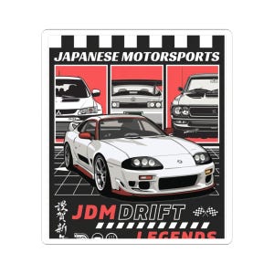 May include: A rectangular sticker featuring the text JAPANESE MOTORSPORTS and JDM DRIFT LEGENDS. The design displays a white sports car in the foreground with three other cars in red panels above, all set against a black and white checkered border.