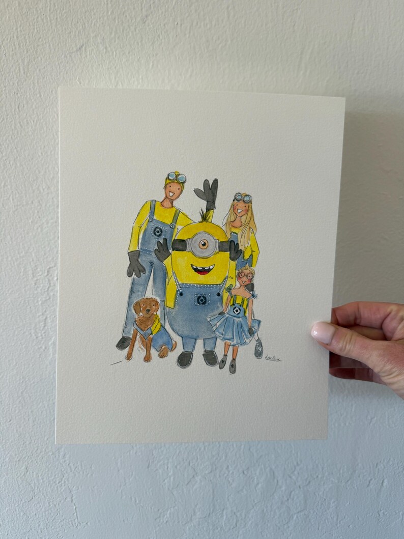 May include: Watercolor illustration of a family with a dog, styled as Minions characters. The figures wear yellow tops and blue overalls. The dog wears a blue vest. The artwork is held by a hand.