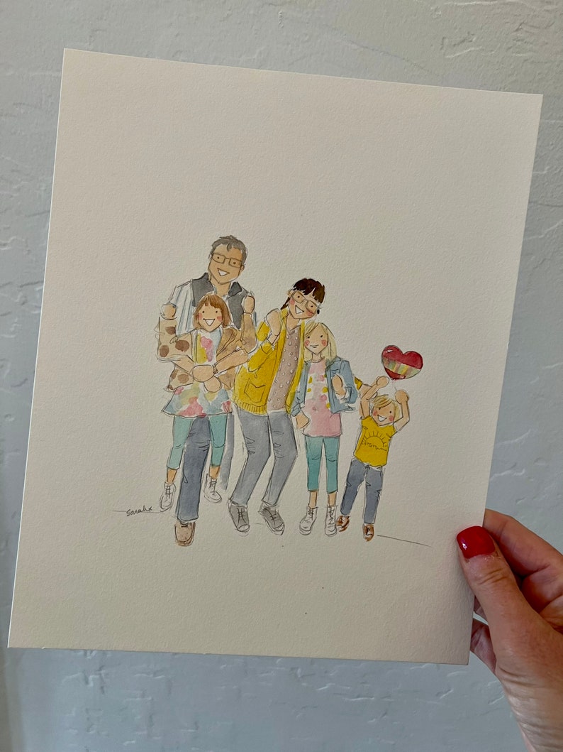 May include: Watercolor illustration of a family of five, with two adults and three children. The artwork features soft colors and depicts the family in casual attire, with one child holding a heart-shaped balloon. The artwork is signed "Sarah x".