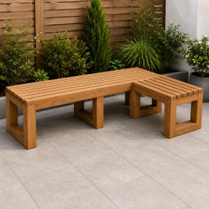 May include: An L-shaped wooden bench featuring a slatted seat design and a sturdy frame with rectangular legs. The bench is constructed from light brown wood with a visible grain, providing a continuous seating surface that forms a corner angle.