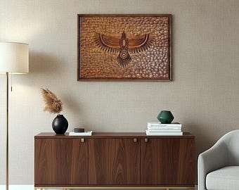 May include: A rectangular wooden wall art piece featuring a carved eagle with outstretched wings centered on a textured, pebble-like background. The artwork is framed in dark wood and displays intricate line details on the bird's body and wings.