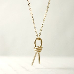 Gouden knoopketting - eenheidsknoop - strikknoop - minimalistische sieraden