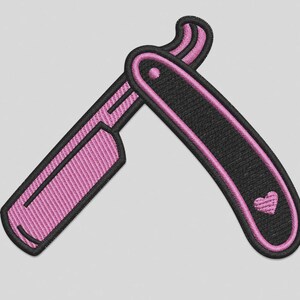 May include: An embroidered patch shaped like a straight razor with a black handle and a pink blade. The handle features a small pink heart near the bottom, and the entire design is outlined in thick black thread with pink accent stitching.