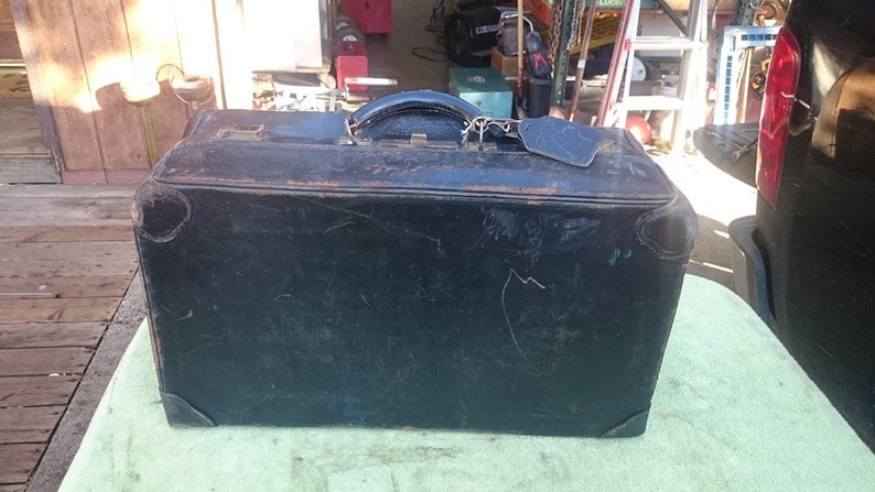 Vintage original Gladstone leather suitcase
