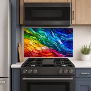 May include: A rectangular kitchen backsplash panel featuring a vibrant, abstract design of flowing, wave-like patterns in a spectrum of colors including red, orange, yellow, green, blue, and purple, with a textured, stained-glass visual effect.