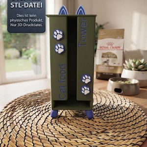 Könnte beinhalten: Ein olivgrüner 3D-gedruckter Katzenfutterturm mit blauen Katzenohren oben, blauen Pfotenabdrücken und dem Text "Cat food" und "Tower" auf der Vorderseite. Das Objekt steht auf vier kleinen blauen Füßen und ist eine digitale Datei.