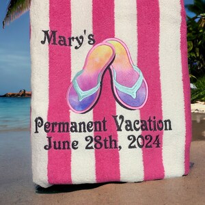 May include: A beach towel with alternating pink and white stripes. The towel features embroidered text that reads "Mary's" and "Permanent Vacation June 28th, 2024". A pair of colorful flip-flops are embroidered on the towel.