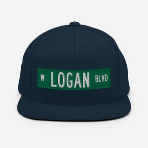 May include: A navy blue baseball cap with a green and white embroidered patch that reads "W LOGAN BLVD".