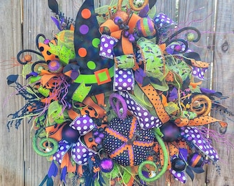 Halloween wreath with witches hat and pumpkins, spooky witch hat, ghostly vibes, creepy ribbons and glitter ribbon, cat pumpkin