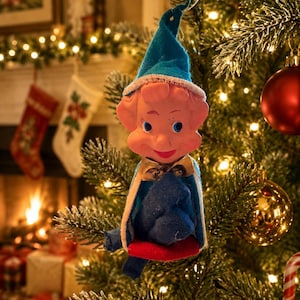 Vintage Japan Pixie Elf Ornament – Flocked Knee Hugger, Holding Blue Teddy Bear, Mid-Century Decoration