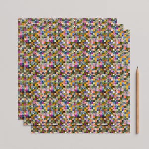 Alternate conservative scrapbook paper sheets application isolated against a neutral unpatterned background.