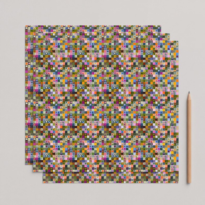 Alternate conservative scrapbook paper sheets application isolated against a neutral unpatterned background.