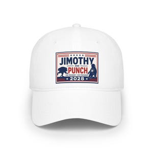 May include: A white baseball cap featuring a rectangular graphic with red and blue stripes. The text reads JIMOTHY AND PUNCH FOR PRESIDENT / VICE PRESIDENT 2028, accompanied by silhouettes of a creature and a monkey, all framed by five stars.