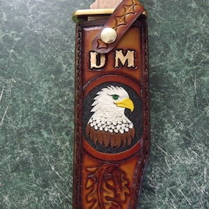 Custom made Bowie knife sheath with eagle and oak leaves. Can be personalized.