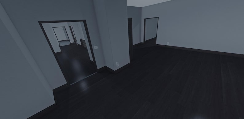Op de afbeelding: Een interieur van een lege kamer met een donkere houten vloer en lichtgrijze muren. De ruimte bevat meerdere deuropeningen naar aangrenzende kamers, donkere plinten en een witte lichtschakelaar gemonteerd op een centraal muurgedeelte.