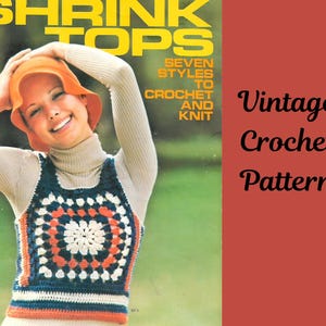 May include: A vintage crochet pattern booklet titled SHRINK TOPS SEVEN STYLES TO CROCHET AND KNIT. The cover features a person wearing an orange hat and a sleeveless top with a navy, white, and orange square motif over a beige turtleneck.