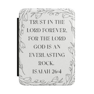 May include: A white rectangular e-reader cover featuring a black line art floral border. The center text reads: TRUST IN THE LORD FOREVER, FOR THE LORD GOD IS AN EVERLASTING ROCK. ISAIAH 26:4. The cover has a textured surface and a black spine edge.