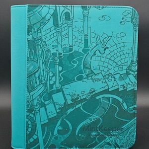 May include: A teal-coloured toploader binder featuring a detailed dark green line art illustration of a fantasy water scene with stone pillars, stairs, and a creature. The text MintKeeper Toploader Binder is printed in the bottom right corner.