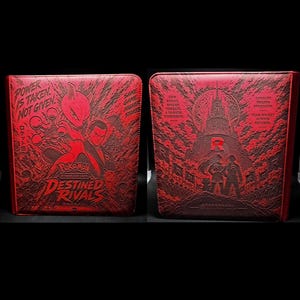 May include: A red Pokémon Trading Card Game binder featuring embossed artwork of Mewtwo and Giovanni on the front cover with the text Power Is Taken Not Given and Destined Rivals. The back cover displays a Team Rocket tower with the letter R.