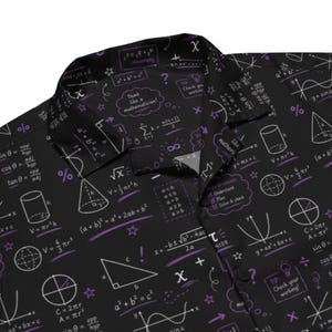 May include: A black button-down shirt featuring a repeating white and purple print of mathematical formulas, geometric shapes, and text including "Think like a mathematician!" and "Steps to success: Understand, Plan, Solve & check."