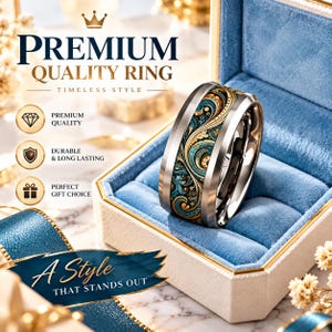 May include: A metallic ring with a wide band featuring an intricate teal, gold, and black swirling pattern. The ring is displayed inside a cream-colored box with a blue velvet interior. Text includes PREMIUM QUALITY RING, TIMELESS STYLE, PREMIUM QUALITY, DURABLE & LONG LASTING, PERFECT GIFT CHOICE, and A STYLE THAT STANDS OUT.