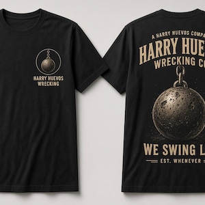May include: A black short-sleeve t-shirt featuring a small graphic on the front left chest of a wrecking ball with the text Harry Huevos Wrecking. The back displays a large wrecking ball graphic with the text Harry Huevos Wrecking Co. We Swing Low Est. Whenever.
