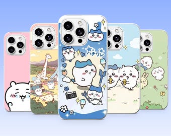 May include: Five smartphone cases featuring cartoon characters. The cases display various pastel backgrounds with illustrations of white creatures, a giraffe, flowers, stars, hearts, a camera, and ice cream. One case includes the Japanese text ハチワレ.