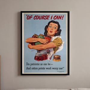 May include: A framed vintage-style poster featuring a person holding several glass jars of preserved food. The text reads: OF COURSE I CAN! I'm patriotic as can be—And ration points won't worry me! The illustration uses a light blue background.