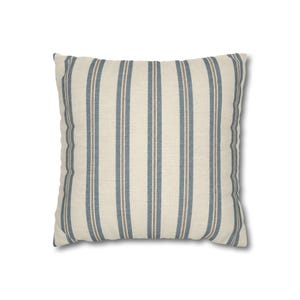 Slate blue ticking stripe square pillow cover on a plain white background.