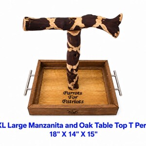 May include: A T-shaped bird perch made of dark brown and tan patterned wood, mounted on a square wooden tray base with silver metal handles. The tray features the engraved text Parrots For Patriots and measures 18 inches by 14 inches by 15 inches.