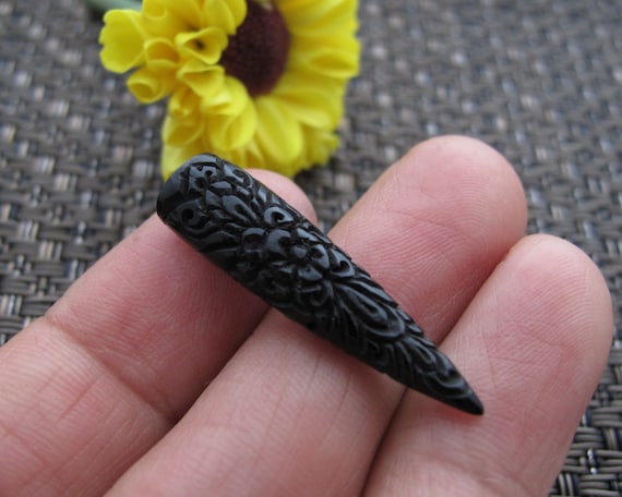 Intricately Carved Tiny Tusk Buffalo Horn , UNDRILLED