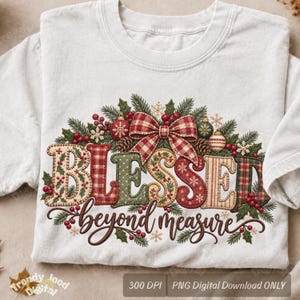 May include: A white t-shirt featuring a graphic design with the text BLESSED beyond measure. The word BLESSED is decorated with red and green plaid, holly berries, pine branches, and a large red and white plaid bow at the top.