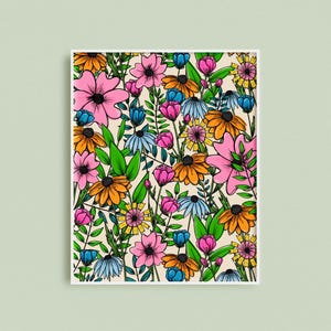 May include: A floral art print featuring a vibrant array of colorful flowers. The artwork showcases pink, orange, blue, and yellow blooms with green foliage against a cream background. The flowers are outlined in black, creating a bold, graphic style.