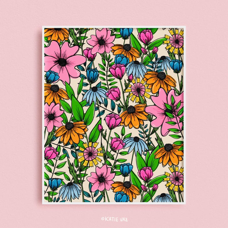 May include: A floral art print featuring a vibrant pattern of colorful flowers. The design includes pink, orange, blue, and yellow blooms with black centers and green foliage, set against a cream background. The artist's name, KATIE VAZ, is in the bottom corner.
