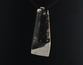Art Jewelry Pendant, White Concrete, Inlaid River Rock, Sterling Silver Glued on 39 Wavy Line 39 Bail, Hangs on a 16.5 Black Silk Cord