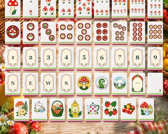 May include: A set of rectangular mahjong tiles featuring various illustrations including mushrooms, numbers one through nine, the letters N, E, W, S, a lantern, a teapot, strawberries, and a picnic basket, all with a white base and green trim.