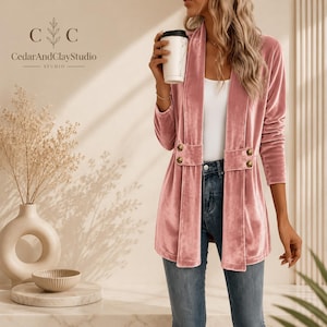 Women’s polyester velvet cardigan in ivory with decorative gold buttons, long sleeves, and a mid-length elegant design.