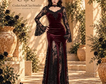 May include: A floor-length burgundy velvet dress featuring long bell sleeves with black lace overlays, a black lace collar, and a front slit revealing a black lace panel. The text CedarAndClayStudio is visible in the upper left corner.