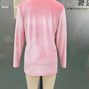 Women’s polyester velvet cardigan in ivory with decorative gold buttons, long sleeves, and a mid-length elegant design.