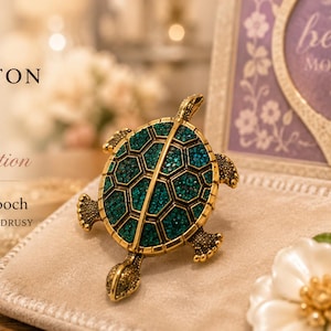 May include: A gold-tone turtle brooch featuring a textured turquoise drusy shell with a geometric pattern. The brooch is displayed alongside text that reads HIGH COTTON Closet BOUTIQUE Brooch Collection Vintage Turtle Brooch GOLD TONE TURQUOISE DRUSY.