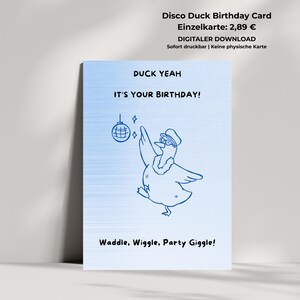May include: A light blue birthday card featuring a dark blue line drawing of a duck wearing a hat and a feather boa, dancing near a disco ball. The text reads: DUCK YEAH, IT'S YOUR BIRTHDAY! and Waddle, Wiggle, Party Giggle! in a simple black font.