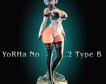 May include: A collectible figurine of YoRHa No.2 Type B featuring short white hair, a black blindfold, and a black and white leotard with cutouts. The figure wears long black gloves and thigh-high boots, standing on a textured base with text.