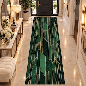 May include: A long rectangular runner rug featuring a geometric pattern of deep emerald green and forest green marble-like segments separated by thin, straight gold lines that create a sharp, angular, and modern visual composition.