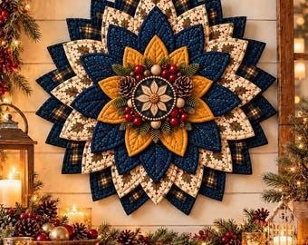 May include: A circular quilted wall hanging featuring layered fabric petals in navy blue, mustard yellow, and cream with holly patterns. The centre is decorated with pinecones, red berries, and a small floral medallion with stitched details.