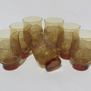 7 Victorian Style Raised Relief Amber Colored Glasses Lot of Seven 7 Scrolling Floral Design Motif image 1