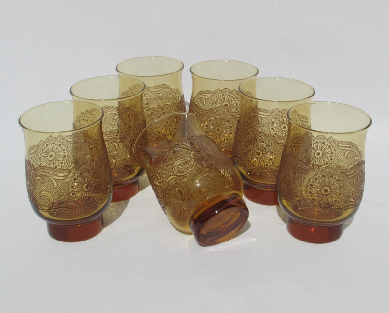 7 Victorian Style Raised Relief Amber Colored Glasses Lot of Seven 7 Scrolling Floral Design Motif image 1