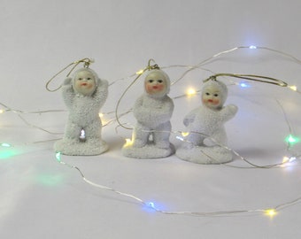 Set of Three (3) Snowbaby Figurines - Ornaments - White Snow-suited Babies Playing in the Snow - Vintage Home Decor