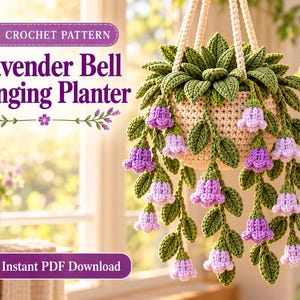 May include: A crochet pattern for a Lavender Bell Hanging Planter. The image shows a beige crocheted basket containing a green leafy plant with cascading purple and light purple bell-shaped flowers. Text reads: Crochet Pattern, Lavender Bell Hanging Planter, Instant PDF Download.