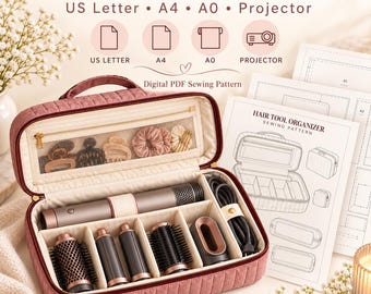 May include: A dusty rose quilted fabric storage case with a zippered mesh pocket containing hair accessories, and a main compartment holding a hair styling tool with various attachments. Includes printed sewing pattern sheets labeled Hair Tool Organizer.