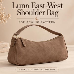 May include: A brown suede shoulder bag with a top zipper closure and a single handle. The text reads Luna East-West Shoulder Bag, PDF Sewing Pattern, 2 Sizes, Confident Beginner. The bag has a horizontal rectangular shape with rounded edges.